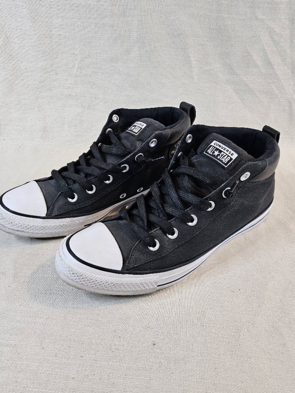 Converse Black and White Mid-Top Sneakers